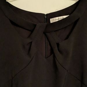 Black sleeveless sheath dress